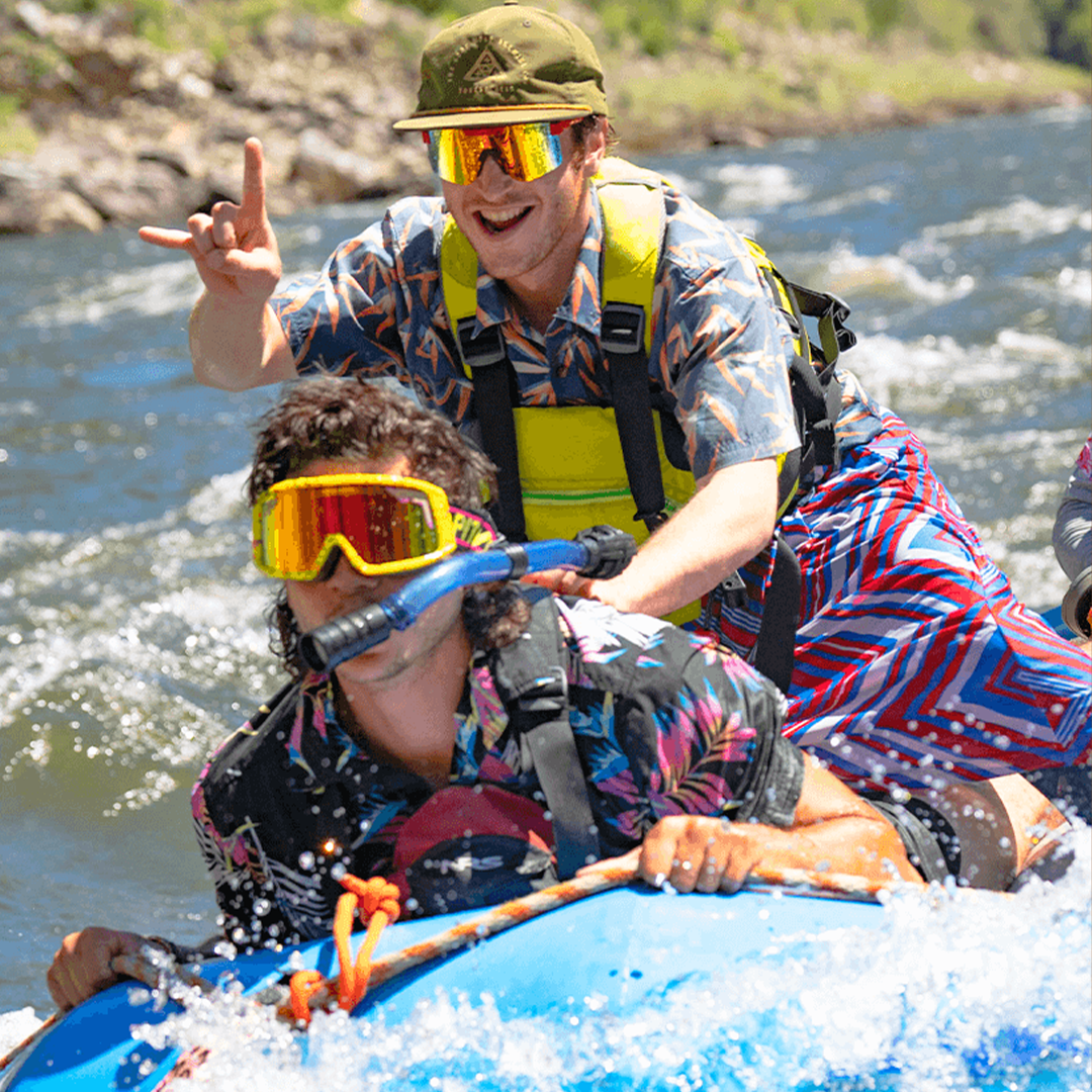 Two men tubing wearing The Hotshot Original from Pit Viper Sunglasses