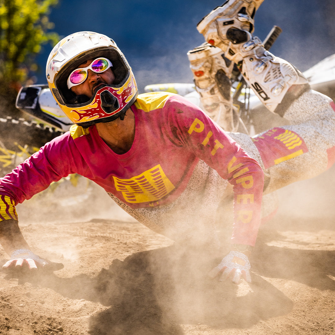 Man falling off of a dirt bike wearing Pit Viper Sunglasses